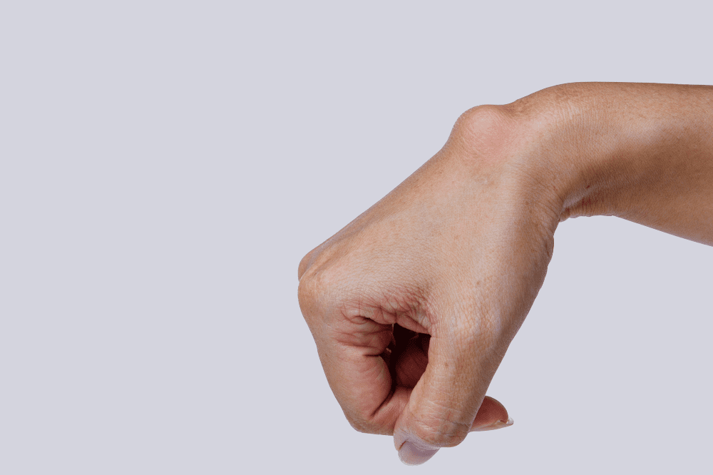 A hand with one finger pointing to the side.